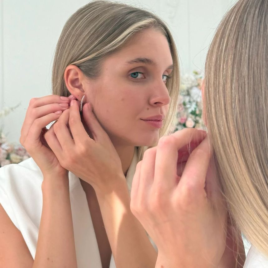 як зняти сережку з вуха